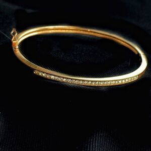 Swarovski Crystal channel set gold hinged bracelet